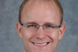 Brett W. Jagger, MD, PhD co-authors manual chapter