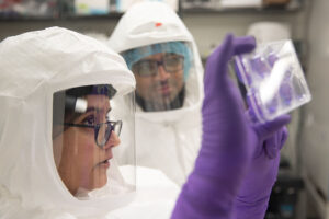 Jennifer Philips, MD, PhD, an associate professor of medicine and co-director of the Division of Infectious Diseases sets up high-security biosafety lab to screen potential COVID-19 antiviral drugs.