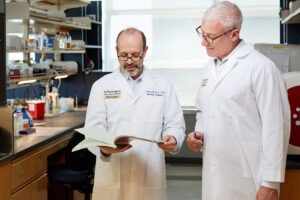 Michael Diamond, MD, PhD and Sean Whelan, PhD lead a team working to minimize risk of another pandemic