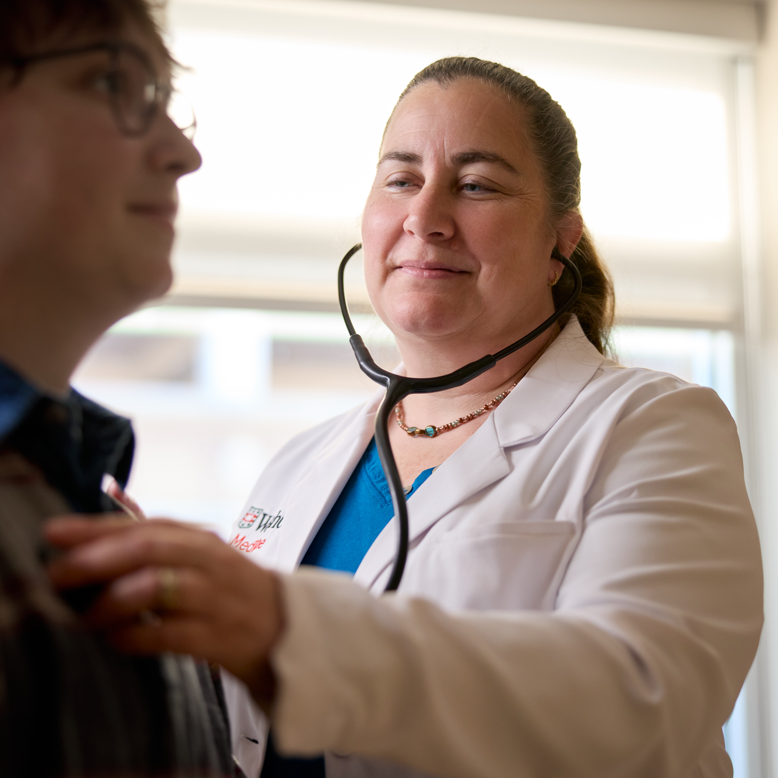 Rachel M. Presti, MD, PhD, demonstrates how to examine a patient in the Infectious Diseases Clinic on October 30, 2025.
