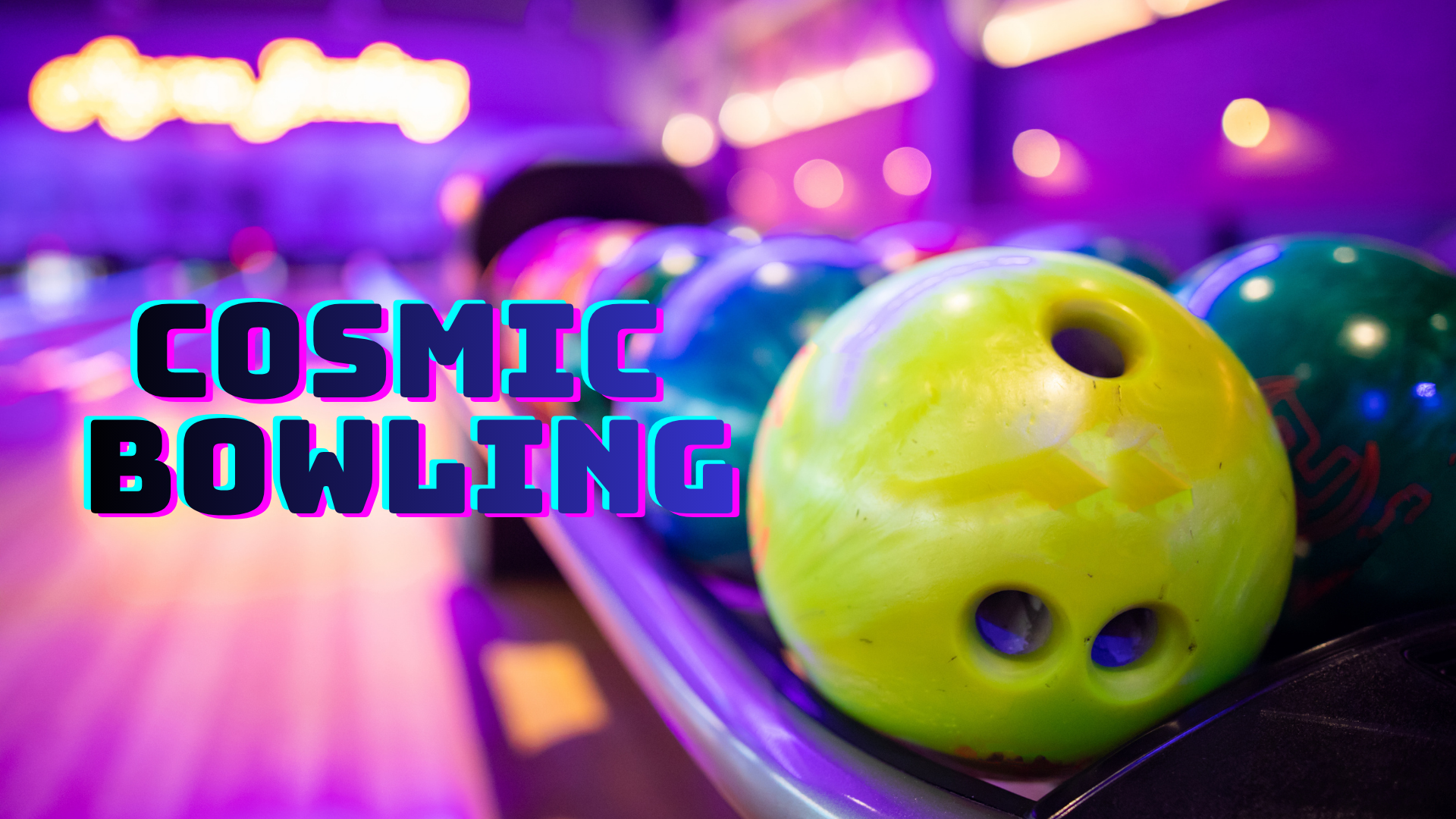 Photo of bowling balls lined up at a lane in a bowling alley.